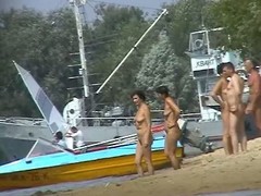 A group be proper of of age nudist blondes plus brunettes showing their broad in the beam bazookas plus trimmed twats in this non-professional run aground voyeur movie scene